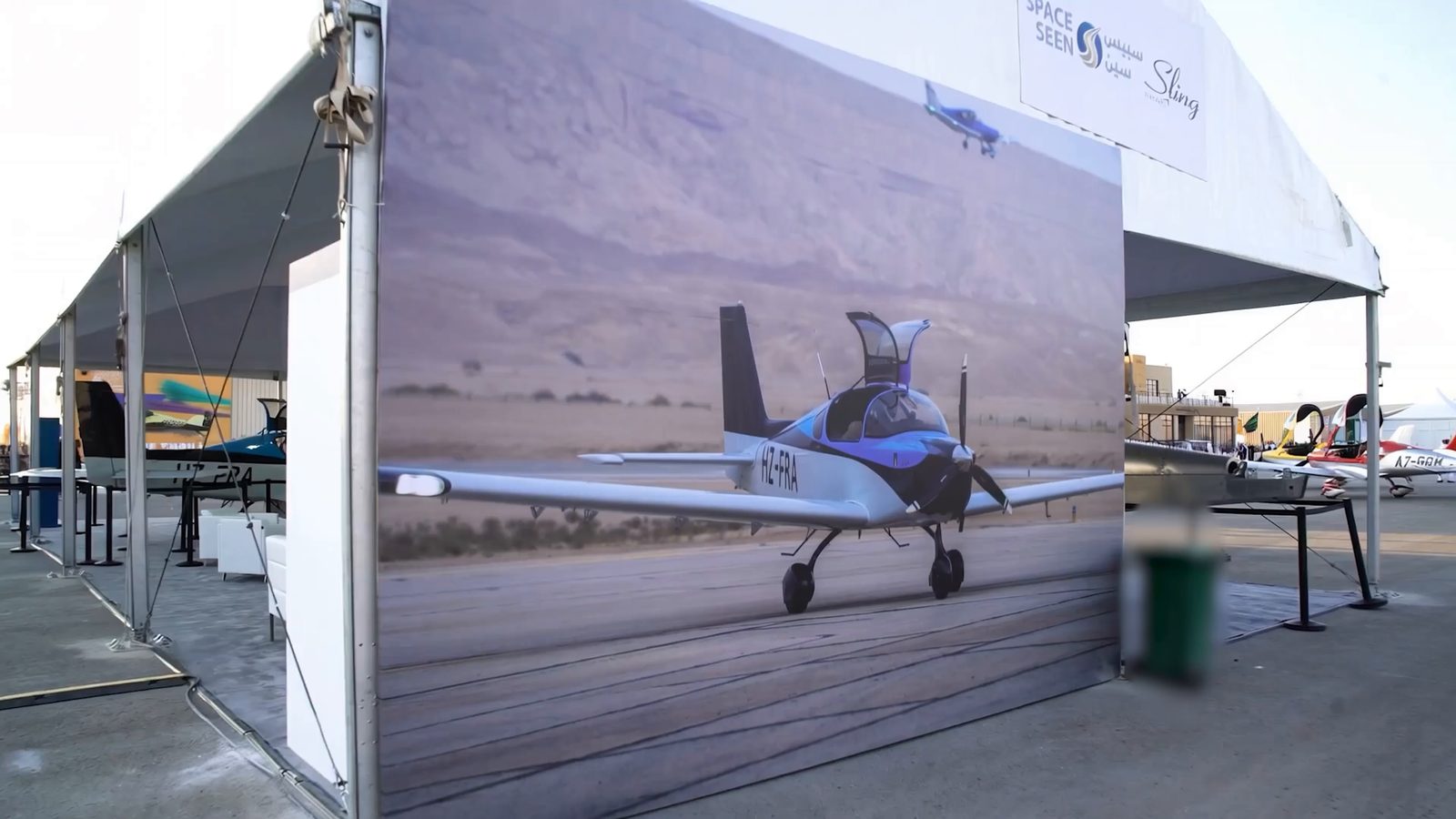 The SpaceSeen and Sling Aircraft stand at Sand & Fun 2025
